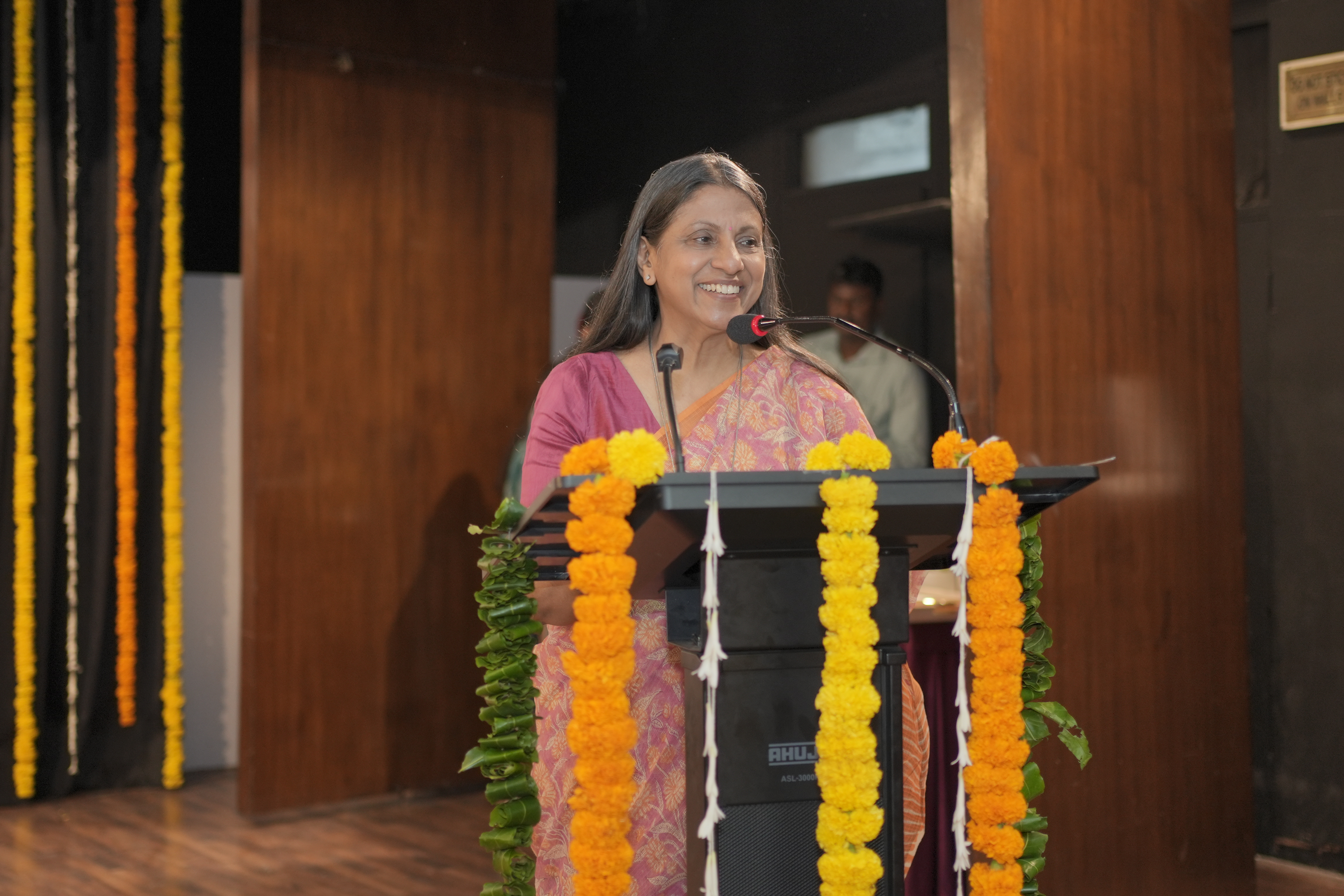 Chief Executive Officer speaking at a podium